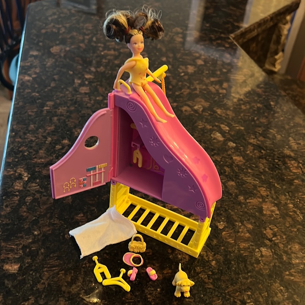 Polly Pocket super slide with Lila play set. Fashion doll with accessories.